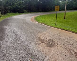 You'll drive past the front of the house on Roselyn Rd. Take a left onto School Road SE. There will be directional signs.