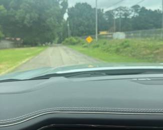 You'll drive past the front of the house on Roselyn Rd. Take a left onto School Road SE. There will be directional signs.