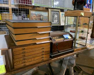 Bound Months of Muskegon Chronicle sitting on Spool Cabinet