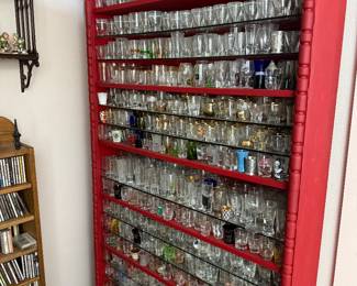Hundreds of shot glasses