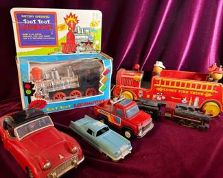 Toot Toot Locomotive, 1950s Looky Fire Truck, And Other Vintage Toys
