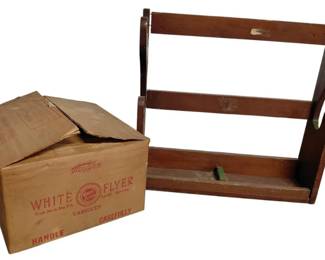Case Of White Flyer Skeet Targets With Vintage Gun Rack