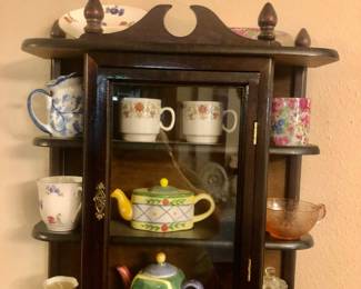 Teapots and cups and saucers