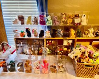 Large collection of beanie babies in cases