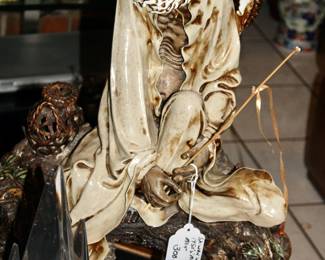 Mud Man with sea creatures surronding the person