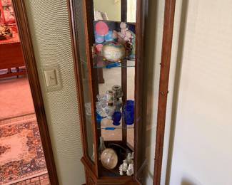 Corner curio cabinet