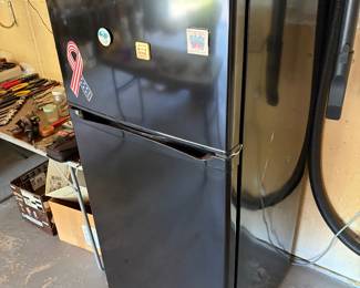 Castle over/under refrigerator freezer.
