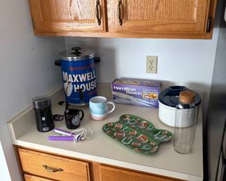 Coffee maker and electric meat carving knife.   
