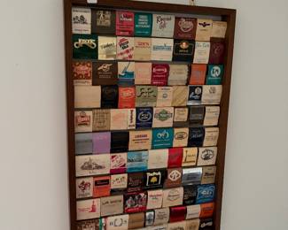 Framed matchbook display.