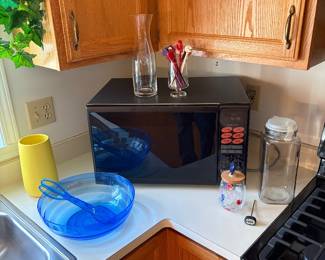 New microwave, stir sticks, salad dish and glassware.