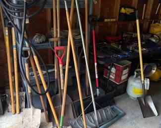 Pushbroom, roof snow shovel and large variety of shovels and rakes.