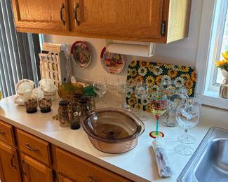 Pyrex, sets of glasses, and stemware.