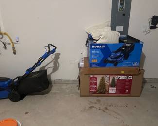Christmas tree $100 and lawnmower and grass eater combine$150