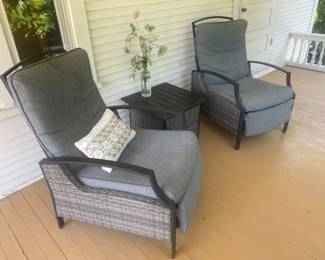 Pair of gray reclining patio chairs