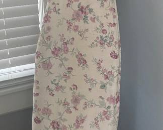 Floral print covered ironing board