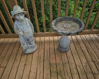 Stone and resign yard statues and bird bath