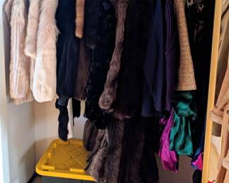 Lots of vintage clothes including furs and party dresses