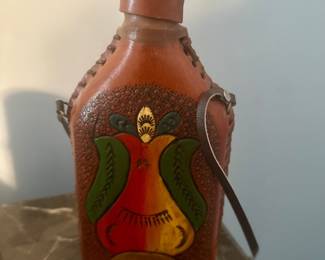 Canteen in leather pouch