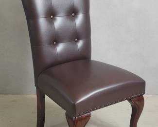 Traditional Round Pedestal Dining Table with Tufted Leather Chairs second image
