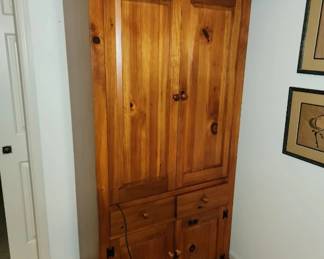 Pine TV cabinet/armoire. TV board slides out, doors slide in.$85.00