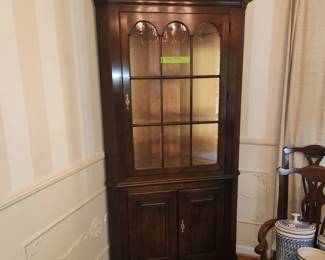 $175. Henkel Harris lighted china cabinet. BUYER MOVES