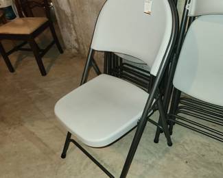 $10 EACH. 12 resin chairs, never used