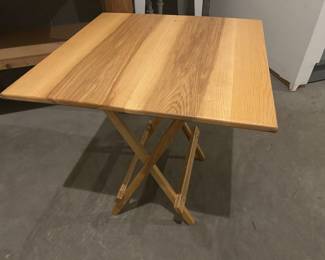 Folding wooden table
