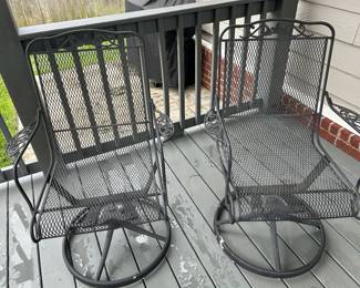 2 swivel rocking wrought iron chairs