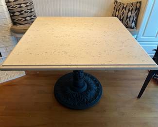 Cast iron base and marble top table