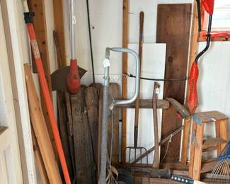 dolly, weed eater, axe, tools, ladder, 