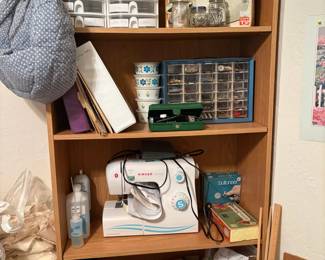 bookcase, Singer sewing machine, sewing and craft items