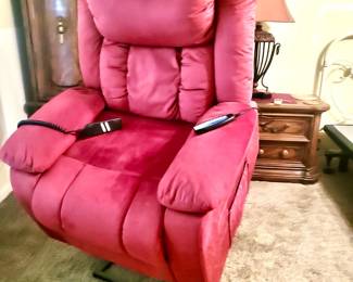Red stand-up Recliner also has heater and vibrator options