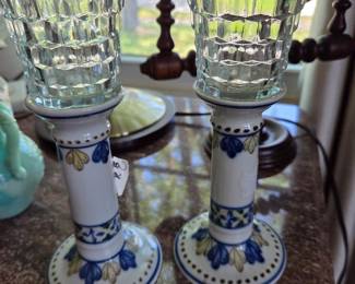 Pair of Hand-Painted Portuguese Ceramic Candlesticks with Blue and Yellow Floral Motif