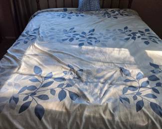 Vintage Wooden Spindle Bed with Blue Floral Bedding