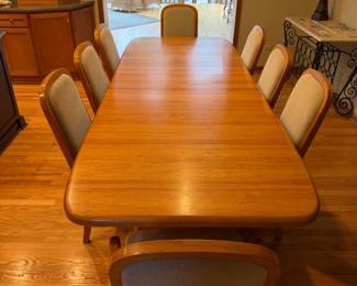 Solid Oak Dining Table w/ Chairs 108" long x 42" wide X 29" high with both leaves in. Each leaf 24", so 60" long with no leaves