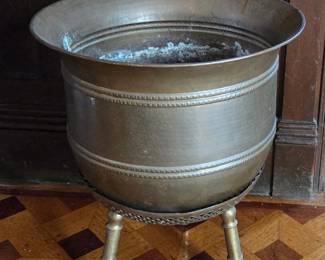 Large brass plant pot on brass three legged stand