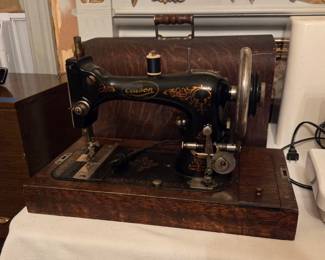 Portable Edison sewing machine with tiger oak box