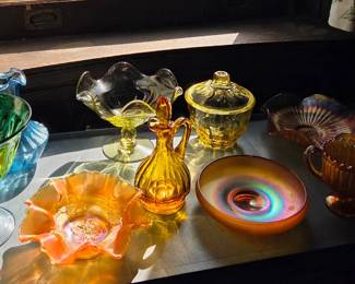 Lots of vintage and antique colored and carnival glass