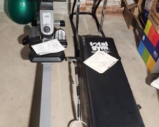 Yoga balls, "Sunny" Magnetic rowing machine, "Total Gym" Exercise System by West Bend