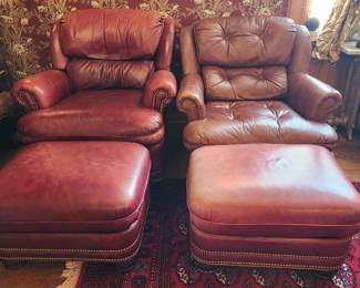 Stuffed leather chairs with ottomans