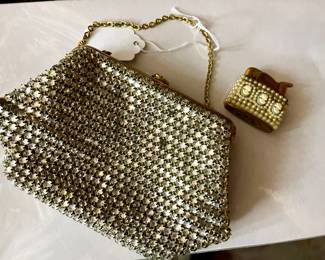 Vintage bejeweled purse with a mirror and lighter inside