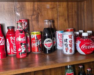 Coca Cola collectibles from historical events and different countries