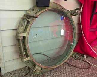 Awesome 21 inch, heavy-duty, antique brass nautical porthole window featuring a hinged design with multiple locking dogs