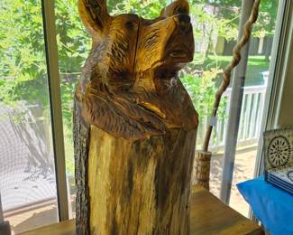 Carved wooded bear sculpture. Has been repaired.