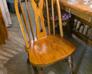 Six Oak dining room chairs.