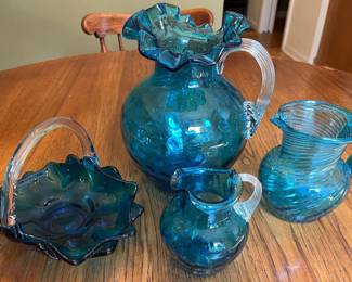 Blue art glass by Fenton and others.