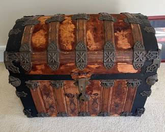 Victorian-era humpback steamer trunk.