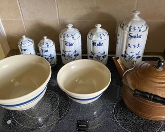 Vintage WVL canister set; copper kettle; stoneware mixing bowls.