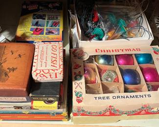 Many antique toys, games, and Christmas ornaments.