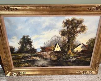 Landscape oil painting in ornate, gold-colored frame.